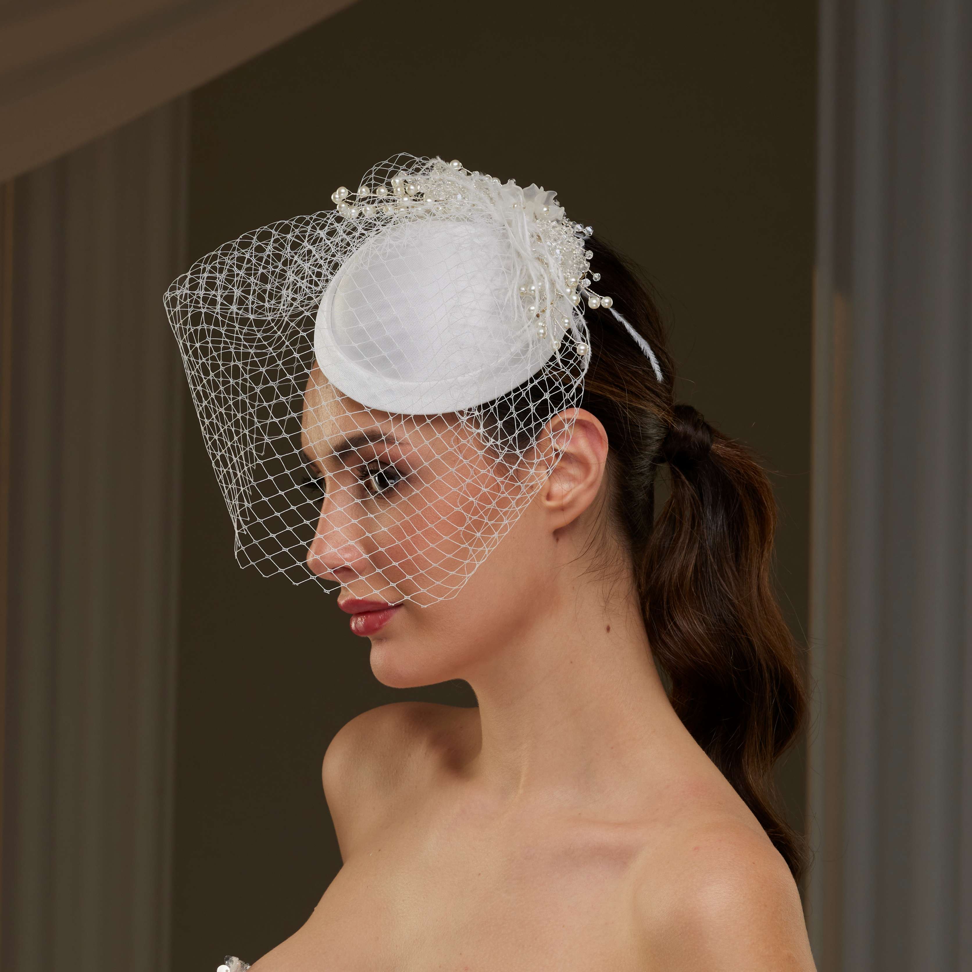 Elegant  Bridal Fascinator with Birdcage Veil, Pearls & Feathers