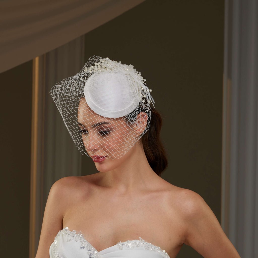 Elegant  Bridal Fascinator with Birdcage Veil, Pearls & Feathers