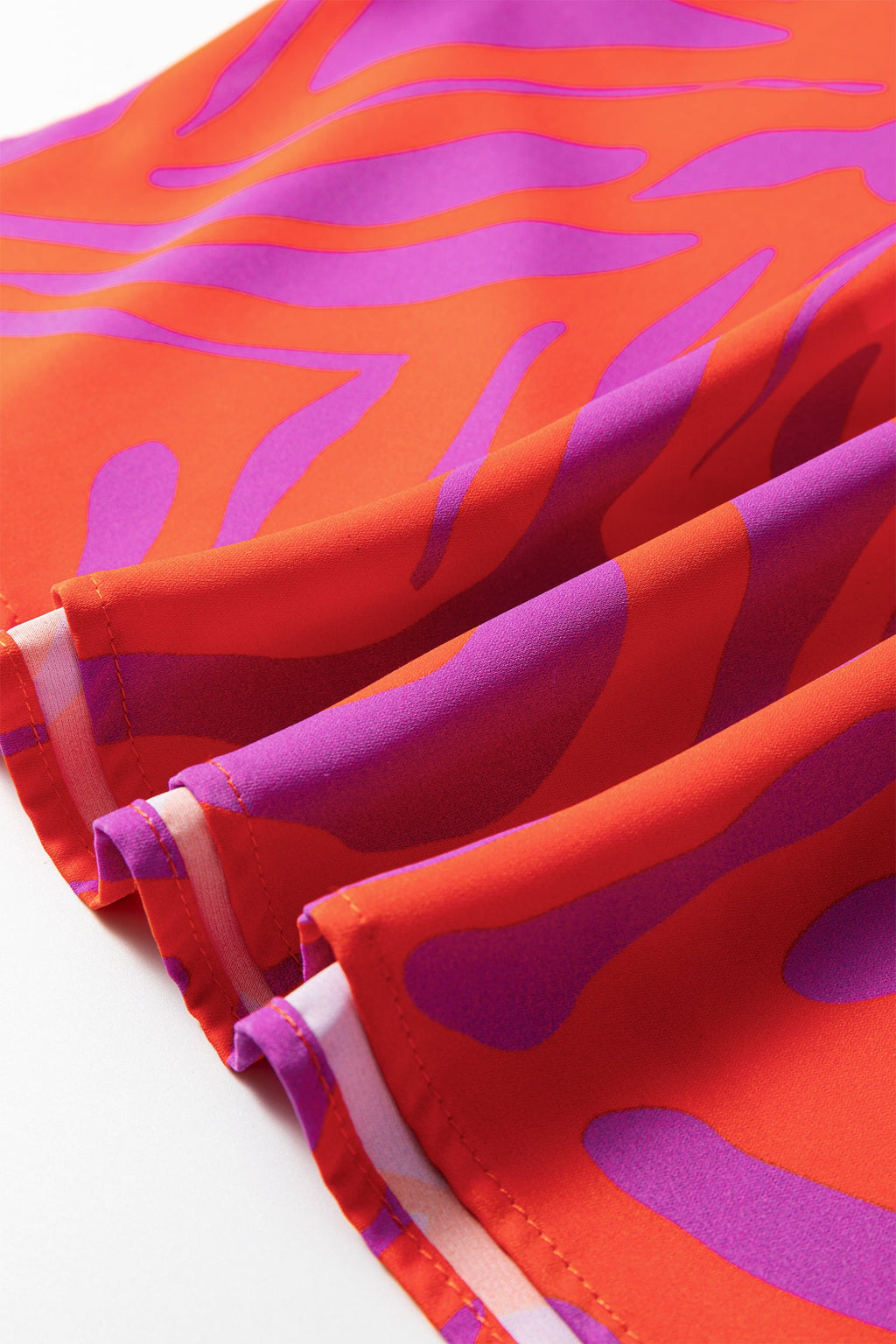 Abstract V-Neck Cuffed Short Sleeve Blouse