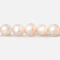 6x5mm - 7x6mm Peach Baroque Freshwater Pearls 14 inch 60 beads